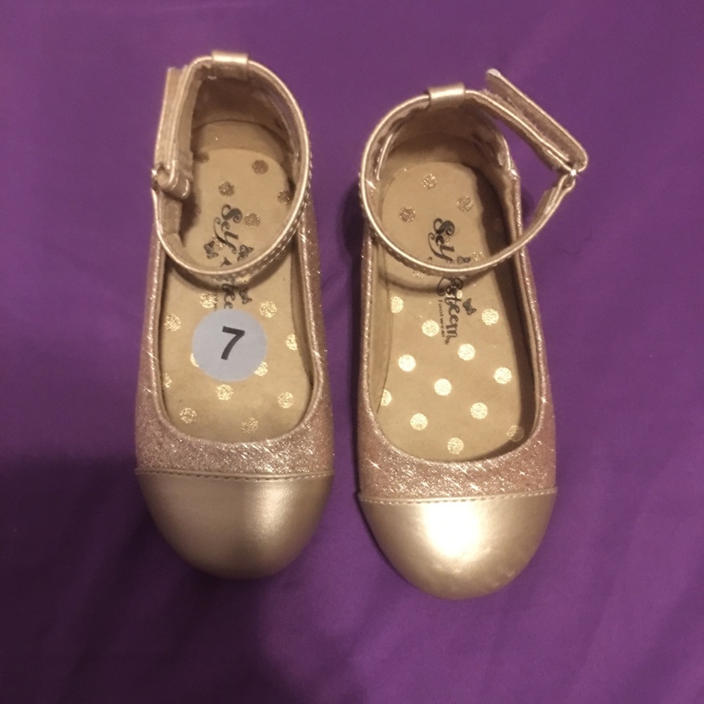 Rose gold flats size 7